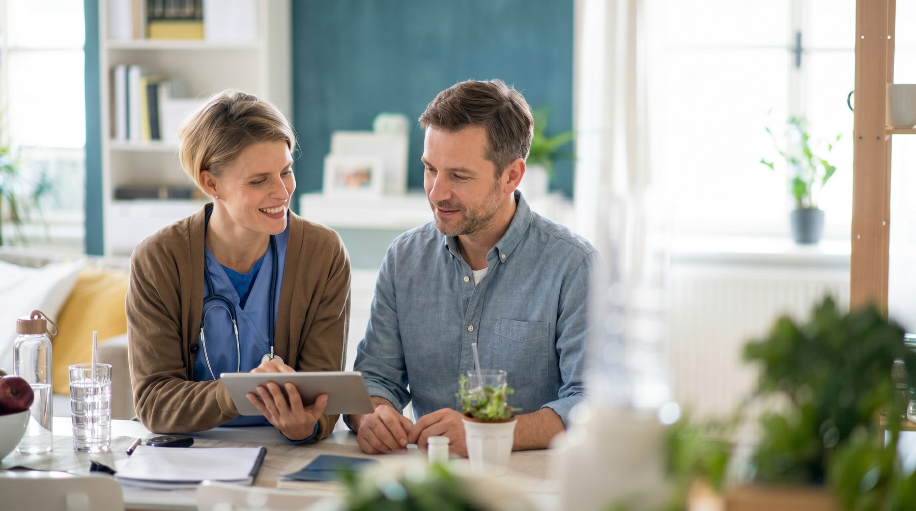 A QuantifyRx pharmacist and bedside nurse coordinating a patient's specialty therapy at home